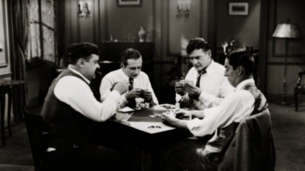 Spilleren 4 men playing cards